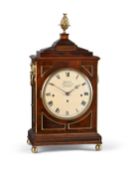 Y A REGENCY BRASS MOUNTED ROSEWOOD QUARTER-CHIMING BRACKET CLOCK