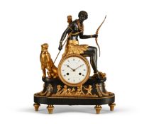 A FINE AND RARE FRENCH EMPIRE PERIOD GILT AND PATINATED BRONZE FIGURAL MANTEL CLOCK ‘L’AFRIQUE'