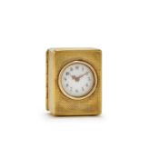 A GEORGE V ENGINE-TURNED SILVER GILT MINIATURE TIMEPIECE