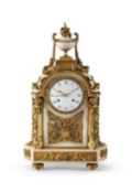 A FRENCH LOUIS XVI ORMOLU MOUNTED WHITE MARBLE MANTEL CLOCK