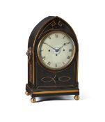 A REGENCY BRASS MOUNTED EBONISED LANCET-SHAPED QUARTER-STRIKING BRACKET CLOCK WITH ALARM
