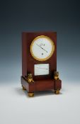 A FINE AND RARE FRENCH CONSULATE PERIOD FIGURED MAHOGANY ‘AUDIENCE’ TIMEPIECE
