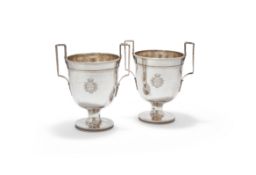 A PAIR OF FRENCH SILVER TWIN HANDLED PEDESTAL WINE COOLERS, MAKER'S MARK AE OVER G