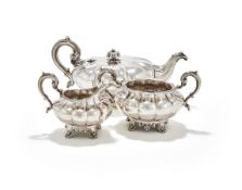 A WILLIAM IV IRISH SILVER THREE PIECE SHAPED CIRCULAR TEA SET, JAMES FRAY, DUBLIN 1832