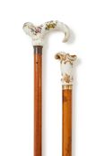 TWO CONTINENTAL PORCELAIN HANDLED WALKING STICKS, 19TH CENTURY