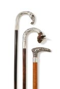 THREE CONTINENTAL FIGURAL WALKING STICKS
