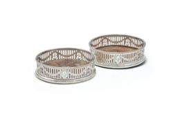 A PAIR OF GEORGE III SILVER WINE COASTERS, ROBERT HENNEL I, LONDON 1776