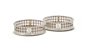 Y A PAIR OF GEORGE III SILVER MOUNTED BOTTLE COASTERS, EDWARD LOWE, LONDON 1770