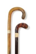Y AN EDWARDIAN 18 CARAT GOLD AND TORTOISESHELL MOUNTED WALKING STICK, BRIGG, LONDON 1901