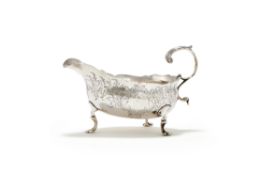 A GEORGE III SILVER SHAPED OVAL CREAM BOAT, JOHN MUNS, LONDON 1763