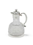 A VICTORIAN SILVER MOUNTED AND CUT GLASS CLARET JUG, DREW & SONS, LONDON 1896