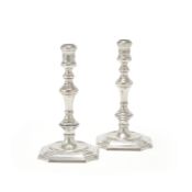 A PAIR OF CAST SILVER CANDLESTICKS, WAKELY & WHEELER, LONDON 1976