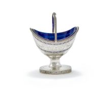 A GEORGE III SILVER SWING HANDLED OVAL PEDESTAL SUGAR BASIN, JOHN WALL, LONDON 1785