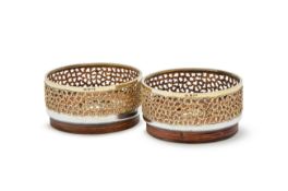 Y STUART DEVLIN, A PAIR OF SILVER AND SILVER GILT WINE COASTERS, LONDON 1970