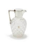A VICTORIAN SILVER MOUNTED AND CUT GLASS CLARET JUG, GOLDSMITHS & SILVERSMITHS CO., LONDON 1897