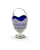A GEORGE SILVER SWING HANDLED SUGAR BASKET, PHILIP FREEMAN, LONDON 1774