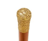 A GOLD MOUNTED WALKING STICK, UNMARKED
