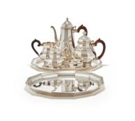 BULGARI LTD., A SILVER BRITANNIA STANDARD FIVE PIECE FACETTED TEA AND COFFEE SET AND TWO TRAYS