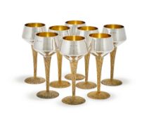 STUART DEVLIN, A SET OF EIGHT SILVER AND SILVER GILT WINE GLASSES, LONDON 1969