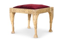 AN OCHRE PAINTED `EGYPTIAN REVIVAL' STOOL, INDIAN, EARLY 20TH CENTURY