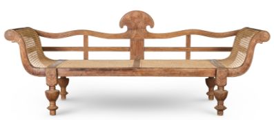 ‡ A CEYLONESE HARDWOOD AND CANED SOFA, CIRCA 1900