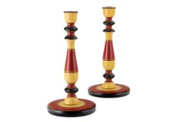 A PAIR OF POLYCHROME PAINTED CANDLESTICKS, INDIAN, MODERN