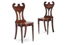 A PAIR OF GEORGE III MAHOGANY AND PAINTED HALL CHAIRS, EARLY 19TH CENTURY