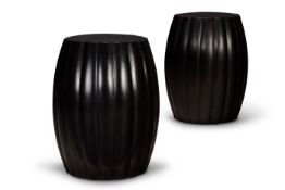 Y A PAIR OF EBONY GADROONED DRUM-SHAPED STOOLS, MODERN