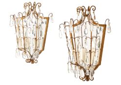 A PAIR OF GILT METAL FRAMED MIRRORED SHIELD BACK WALL LIGHTS, PROBABLY ITALIAN, MID 20TH CENTURY
