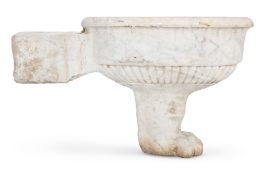 A CARVED WHITE MARBLE LION FOOT OVAL BASIN , 19TH CENTURY