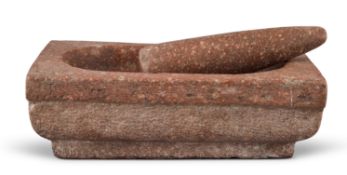 A LARGE CARVED RED HARDSTONE PESTLE AND MORTAR, INDIAN, 20TH CENTURY