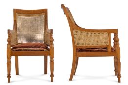 A PAIR OF REGENCY STYLE TEAK AND CANED LIBRARY ARMCHAIRS, INDIAN, MODERN