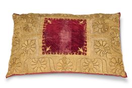 A LARGE GOLD THREAD EMBROIDERED RED VELVET CUSHION, MODERN INCORPORATING 19TH CENTURY INDIAN FABRIC
