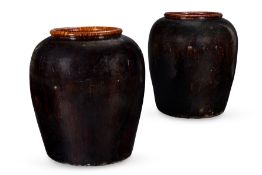 A LARGE PAIR OF SOUTH EAST ASIAN BROWN GLAZED VASES