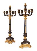 A PAIR OF GILT AND PATINATED BRONZE FIVE LIGHT CANDELABRA, FRENCH, LATE 19TH CENTURY