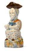 A PEARLWARE 'MARTHA GUNN' TOBY JUG, STAFFORDSHIRE OR SOUTH YORKSHIRE, CIRCA 1800