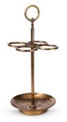 A BRASS FOUR DIVISION STICK STAND, EARLY 20TH CENTURY