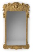 A CARVED GILTWOOD MIRROR, IN GEORGE I STYLE, SECOND HALF 19TH CENTURY