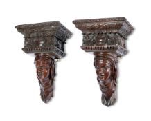 A PAIR OF CARVED MAHOGANY WALL BRACKETS, IN GEORGE II STYLE, 19TH CENTURY
