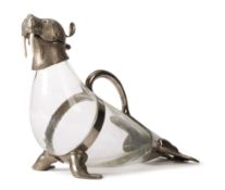 AN ELECTRO PLATED SILVER AND CLEAR GLASS WALRUS CLARET JUG, FRENCH, CIRCA 1950