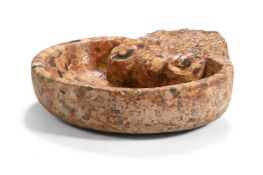 A FRENCH BRECCIA MARBLE OR 'PUDDINGSTONE' SHELL FONT, CIRCA 1880