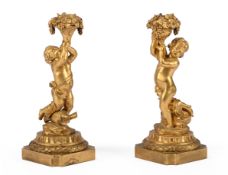 A PAIR OF GILT BRONZE CHERUB CANDELABRA, IN THE MANNER OF HENRI DASSON, 19TH CENTURY