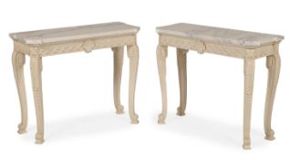 A PAIR OF CARVED WOOD AND GESSO PAINTED CONSOLE TABLES, IN THE MANNER OF WILLIAM KENT, CONTEMPORARY