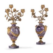 A PAIR OF NAPOLEON III GILT BRONZE MOUNTED STRIATED AMETHYST THREE LIGHT CANDELABRA, CIRCA 1860