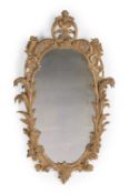 A GEORGE II CARVED GILTWOOD MIRROR, CIRCA 1755