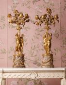 A PAIR OF FRENCH ORMOLU FOUR BRANCH CANDELABRA, IN THE MANNER OF FALCONET, LATE 19TH CENTURY