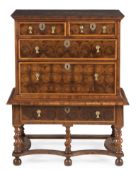 A WILLIAM & MARY OLIVEWOOD OYSTER, FRUITWOOD AND WALNUT CHEST ON STAND, CIRCA 1690