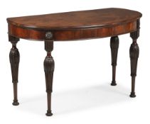 † A FINE AND UNUSUAL GEORGE III MAHOGANY SEMI ELLIPTICAL CONSOLE OR SIDE TABLE, CIRCA 1780