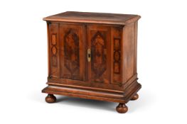 Y A CONTINENTAL WALNUT AND SPECIMEN MARQUETRY TABLE CABINET, PROBABLY FRENCH, FIRST HALF 19TH CENTUR