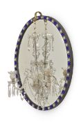 A BLUE AND WHITE BEADED GLASS OVAL MIRROR WITH A CUT GLASS TWO LIGHT CHANDELIER